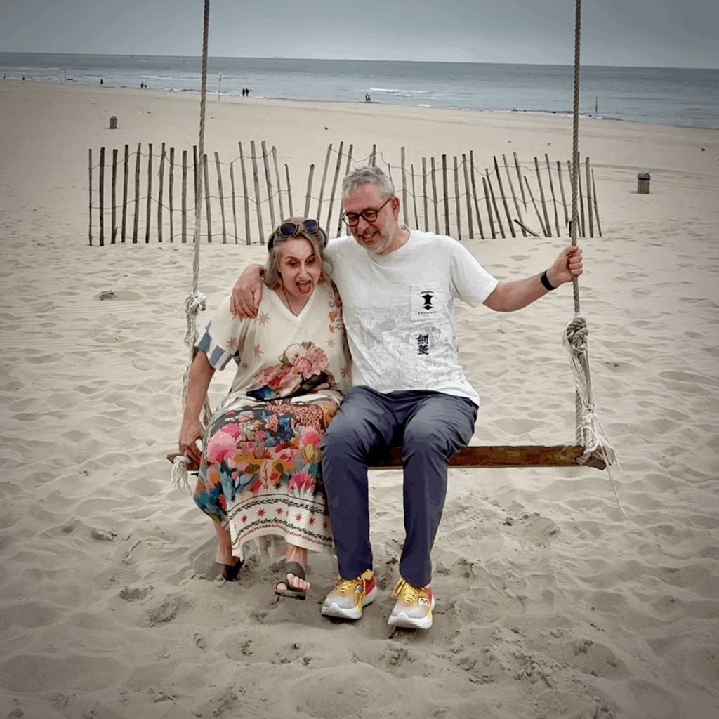 Couple sitting on a swing